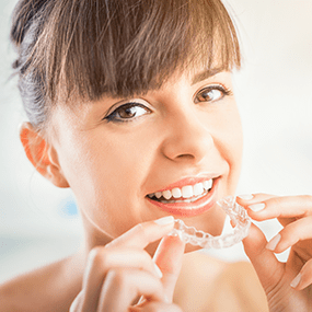 Invisalign clear aligners are as effective as traditional metal braces but without any of the downsides.