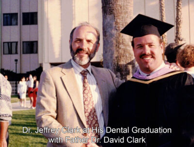 Dr. Clark graduating dental school with his father who is also a dentist.