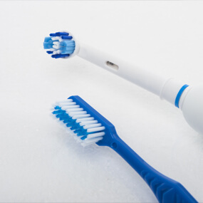 Consider the pros and cons of manual versus electric toothbrushes.