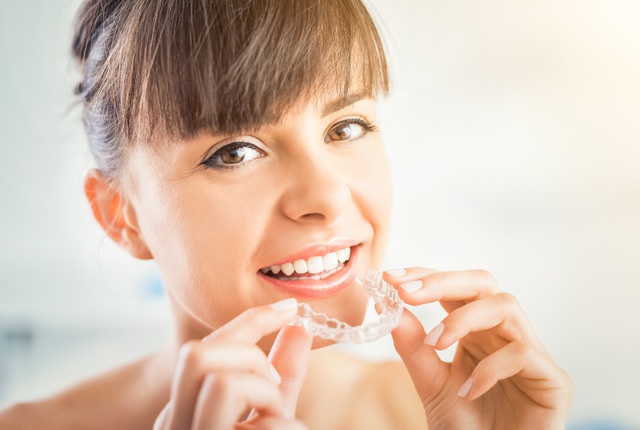 Invisalign clear aligners are as effective as traditional braces but much more convenient and practically imperceptible.